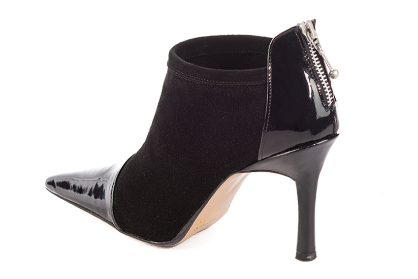 Gloss black women's ankle boots with a zip at the back. Pointed toe. Very high slim heel. Rear view - Florence KOOIJMAN